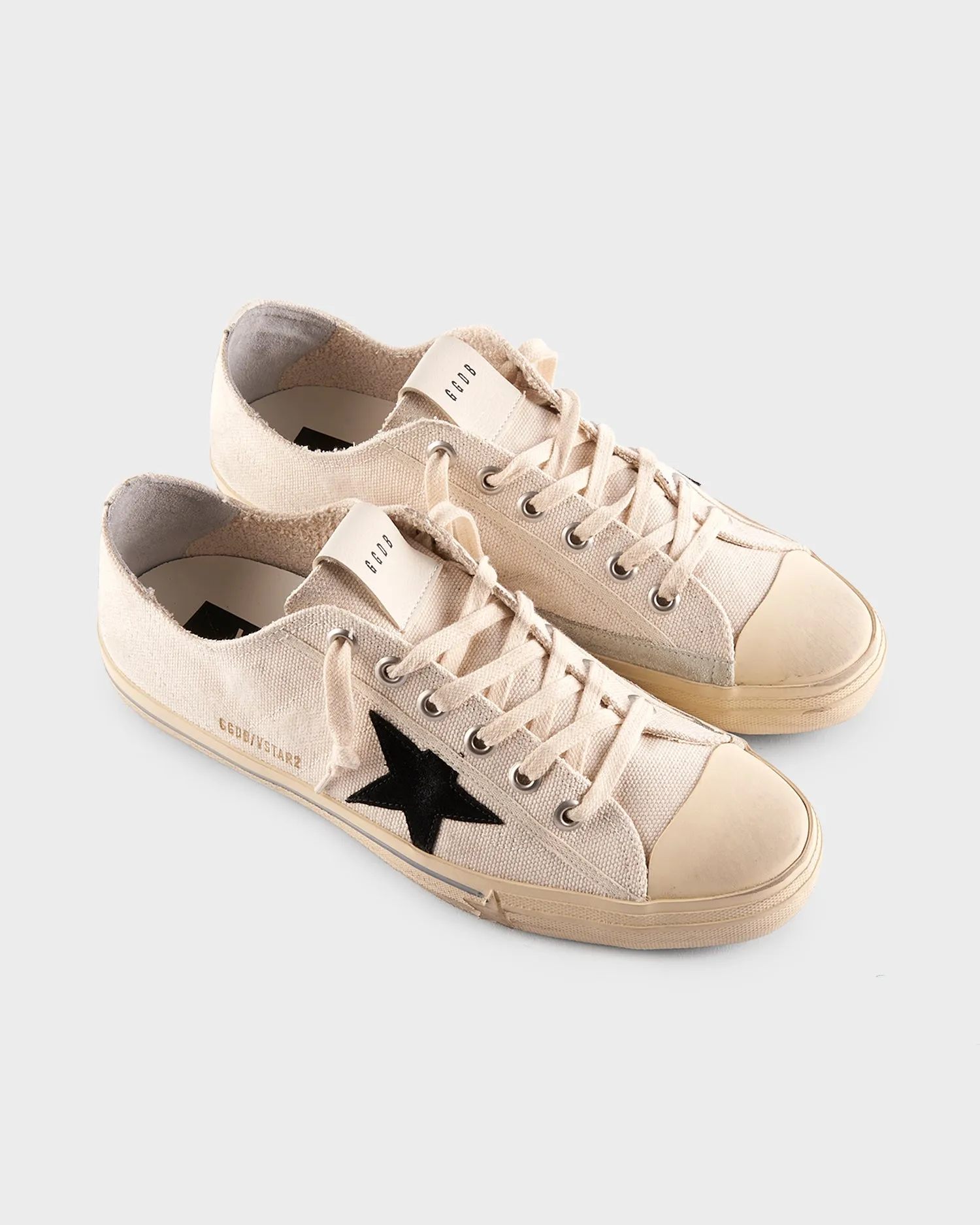 Off White Canvas And Black Star Sneakers
