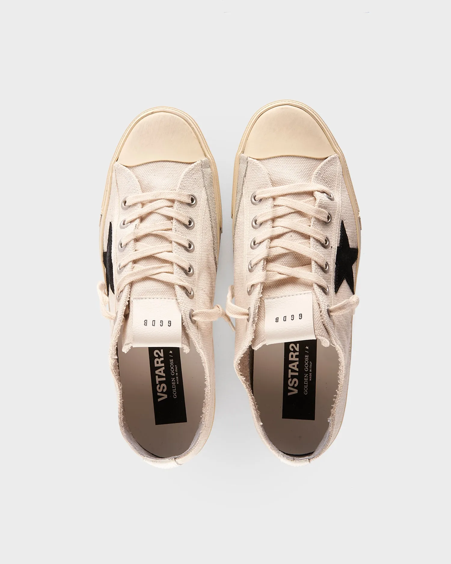Off White Canvas And Black Star Sneakers